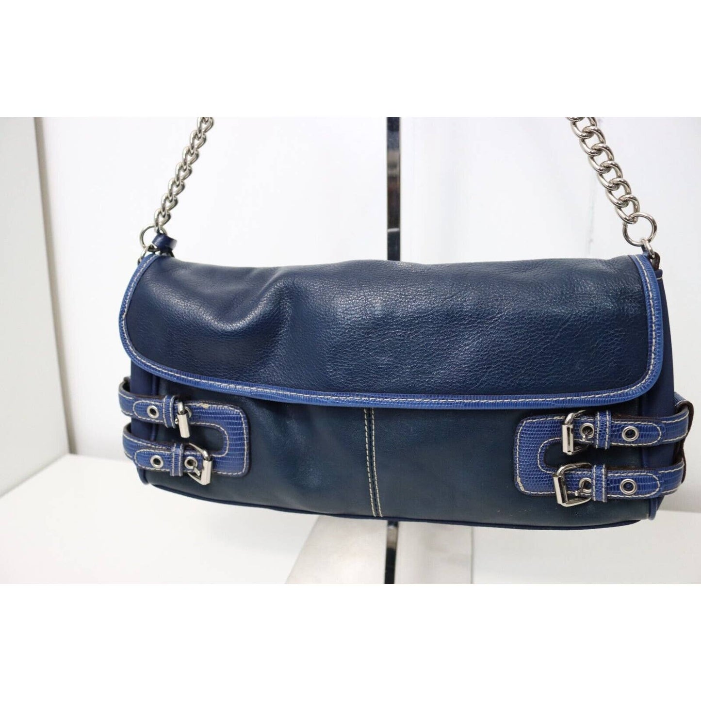 Franco Sarto Blue Leather Purse with a distinctive buckle design and a chic chain on the strap