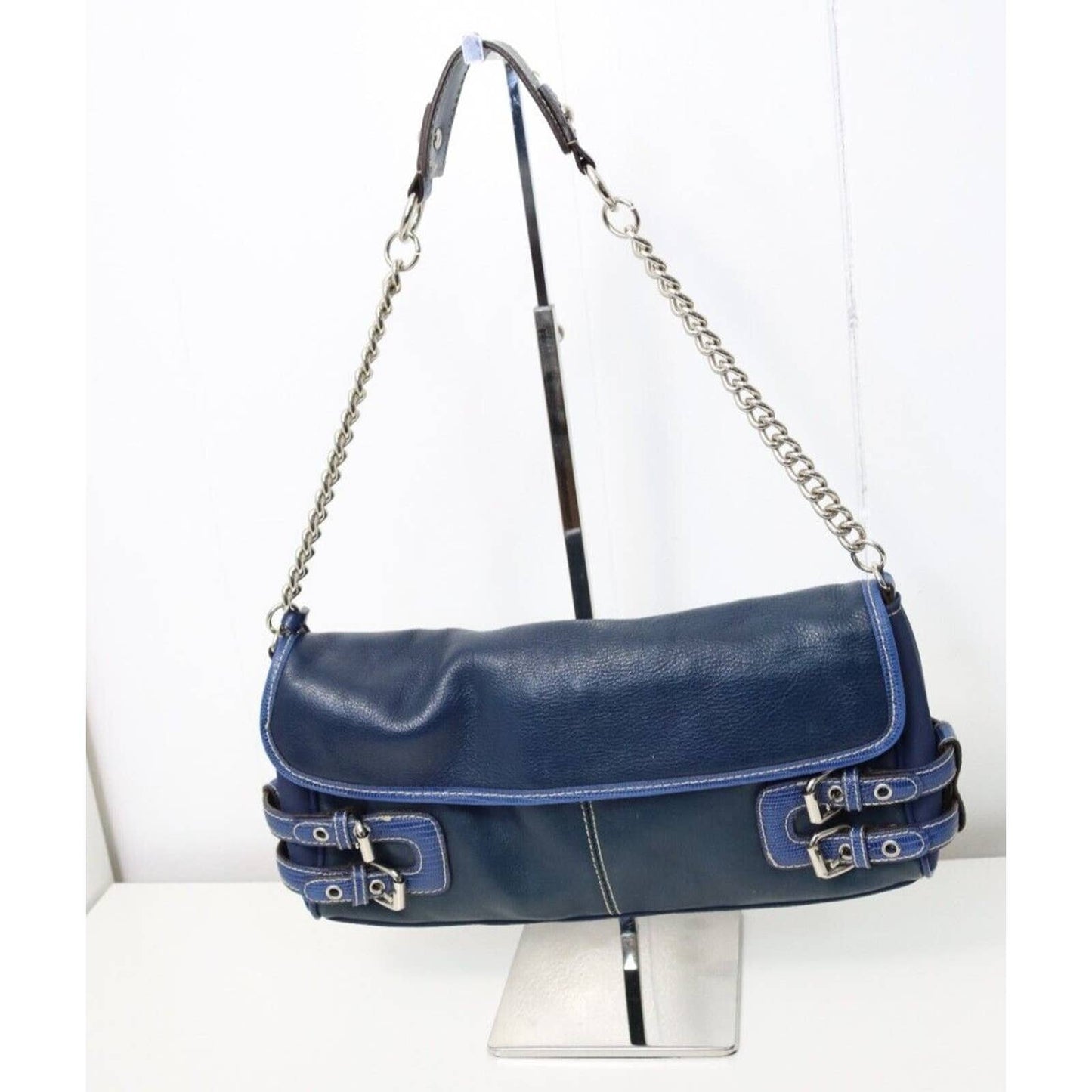 Franco Sarto Blue Leather Purse with a distinctive buckle design and a chic chain on the strap